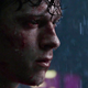 Tom Holland as Peter Parker in Spider-Man: No Way Home, drenched in rain.